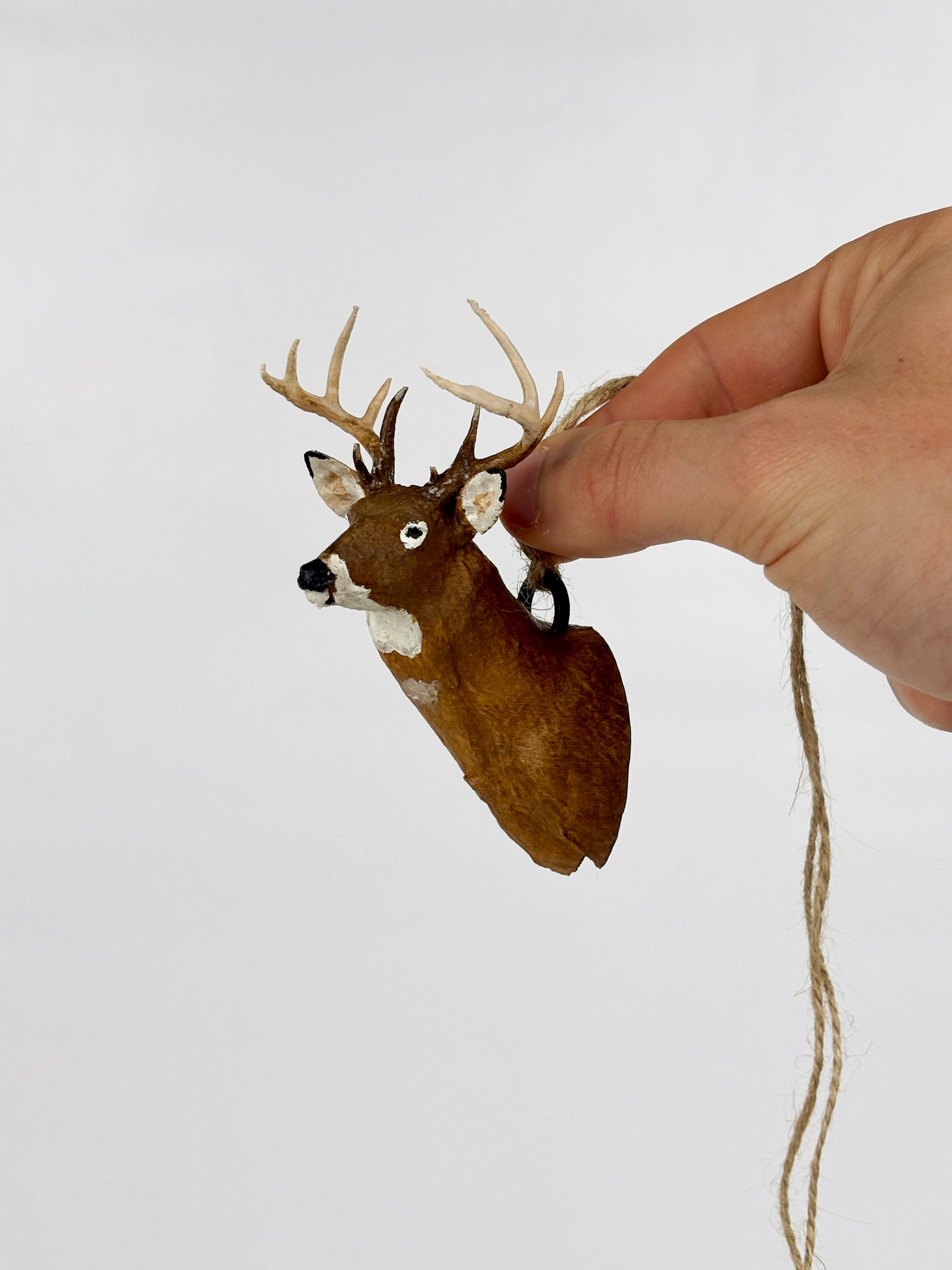 Elevate your hunting trophies with Rutt's Mini Mounts! Transform euro mounts, skulls, shoulder mounts, or sheds into handpainted mini replicas. Ideal for outdoor enthusiasts, hunters, and perfect as a gift for dads. Display proudly on your desk or rearview mirror. Suitable for various animal trophies. Great for desk or car decoration